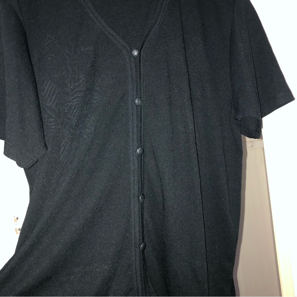 Black shirt with a snowflake design